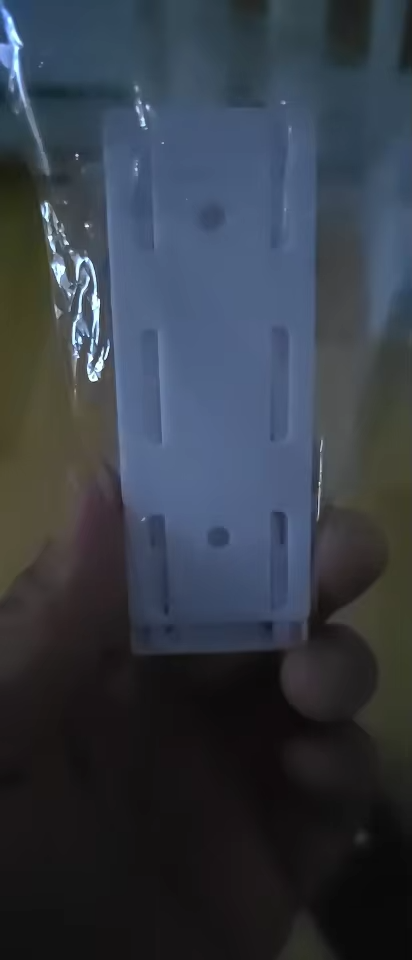 Hållare för väggkontakt photo review