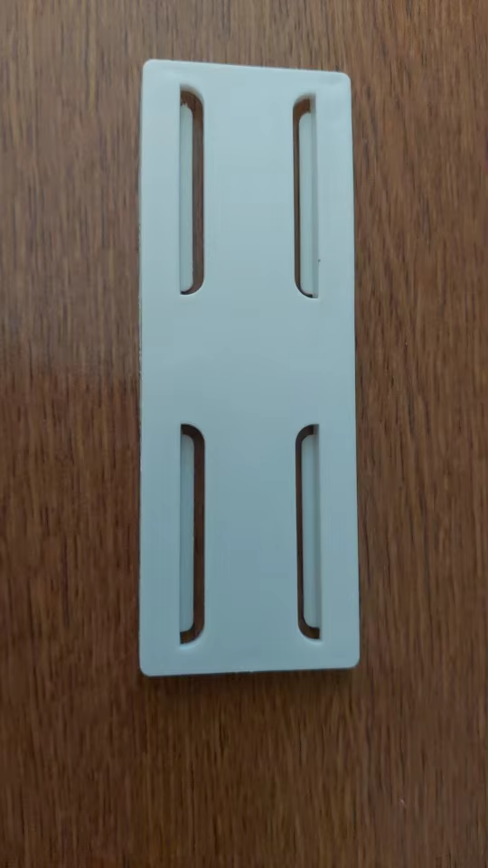 Hållare för väggkontakt photo review