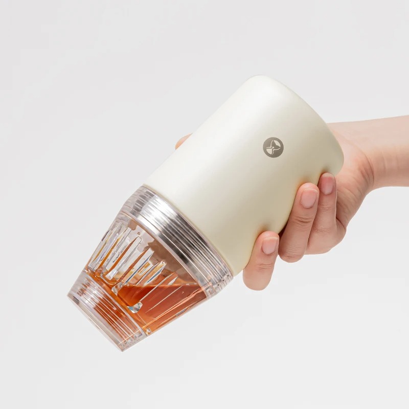 Bärbar kaffekopp med inbyggd droppare