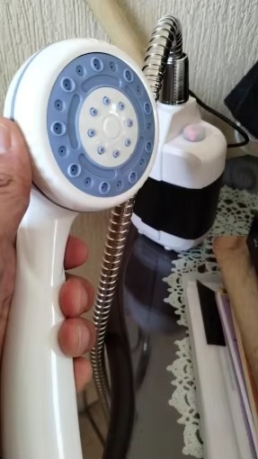 Portable shower pump photo review