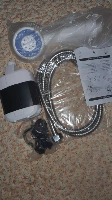 Portable shower pump photo review