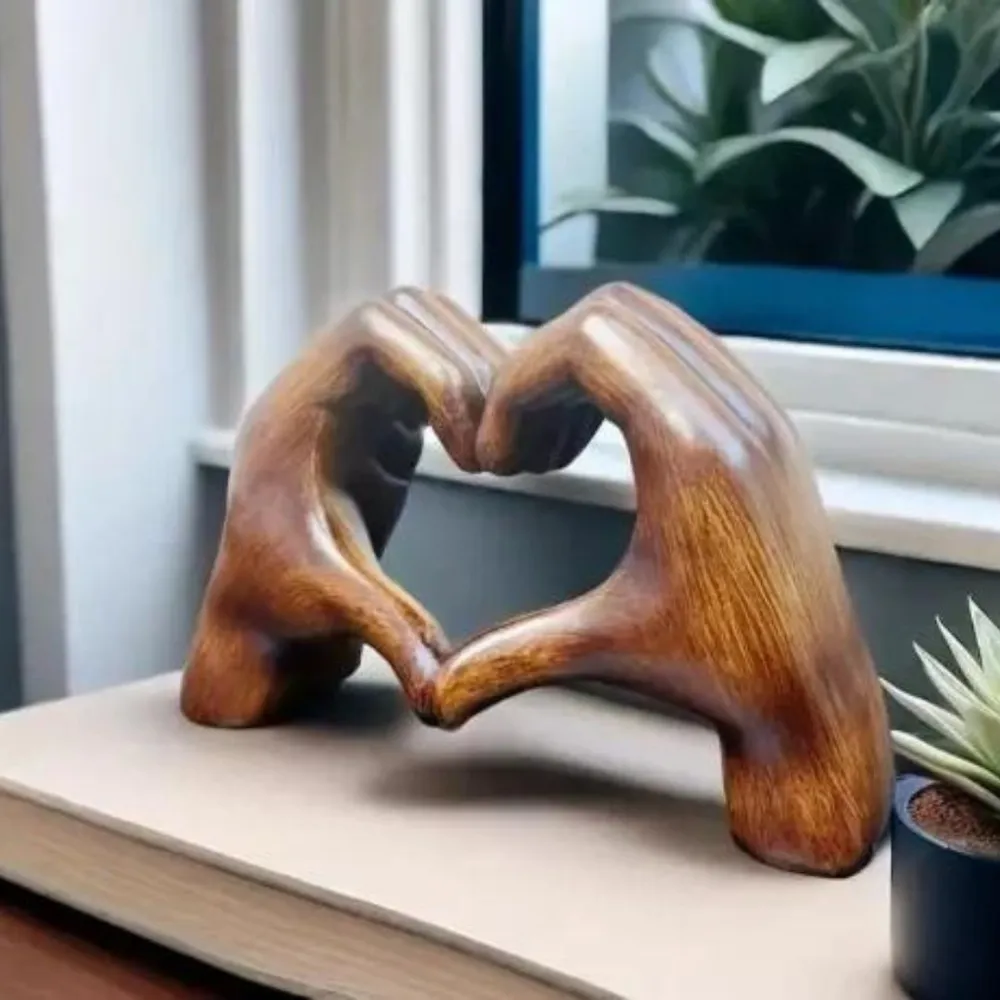 Heart hands sculpture